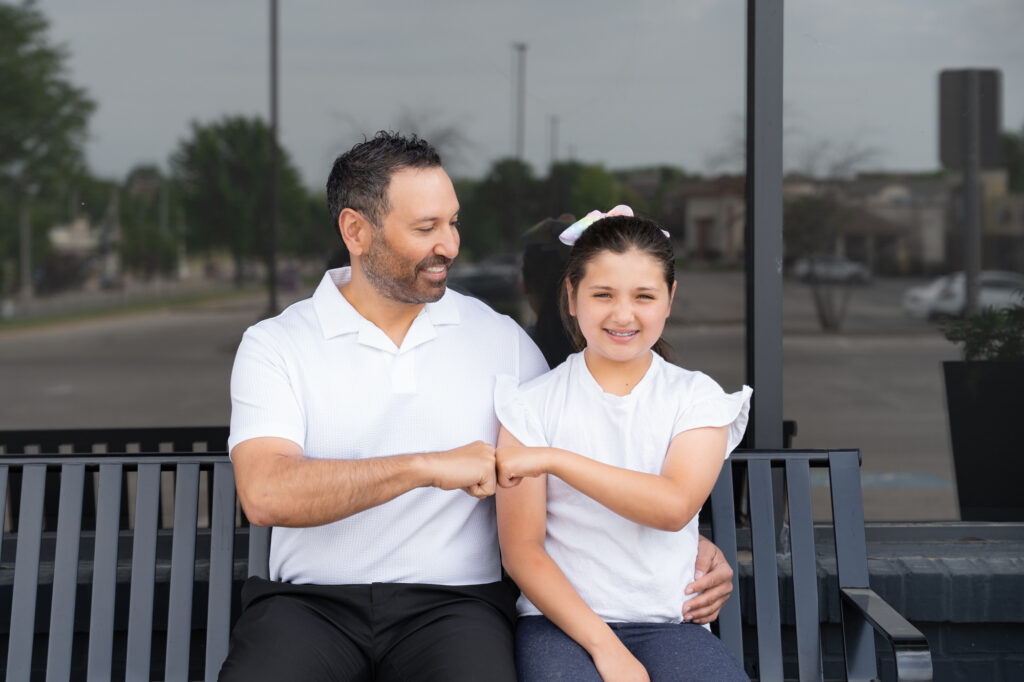 Dr. Ravi Rajanna, Lee's Summit orthodontist, with his daughter